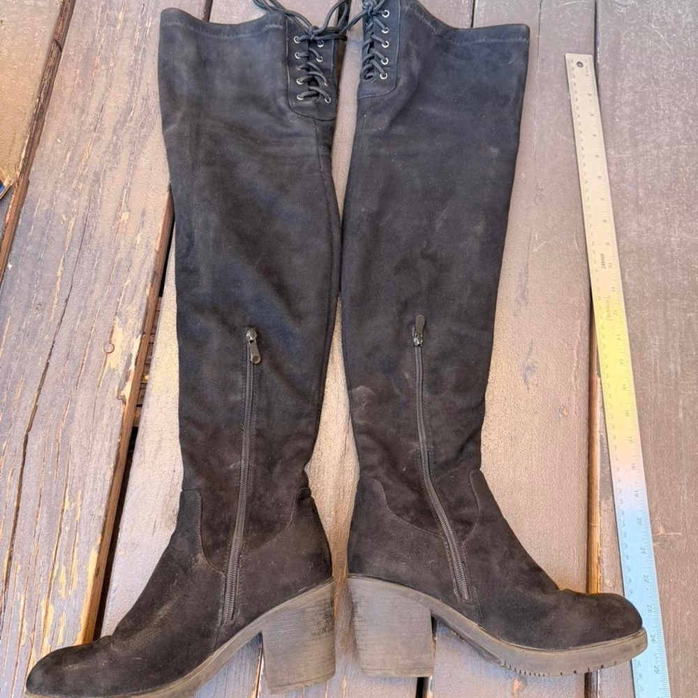Black suede knee high boots with lace up detail